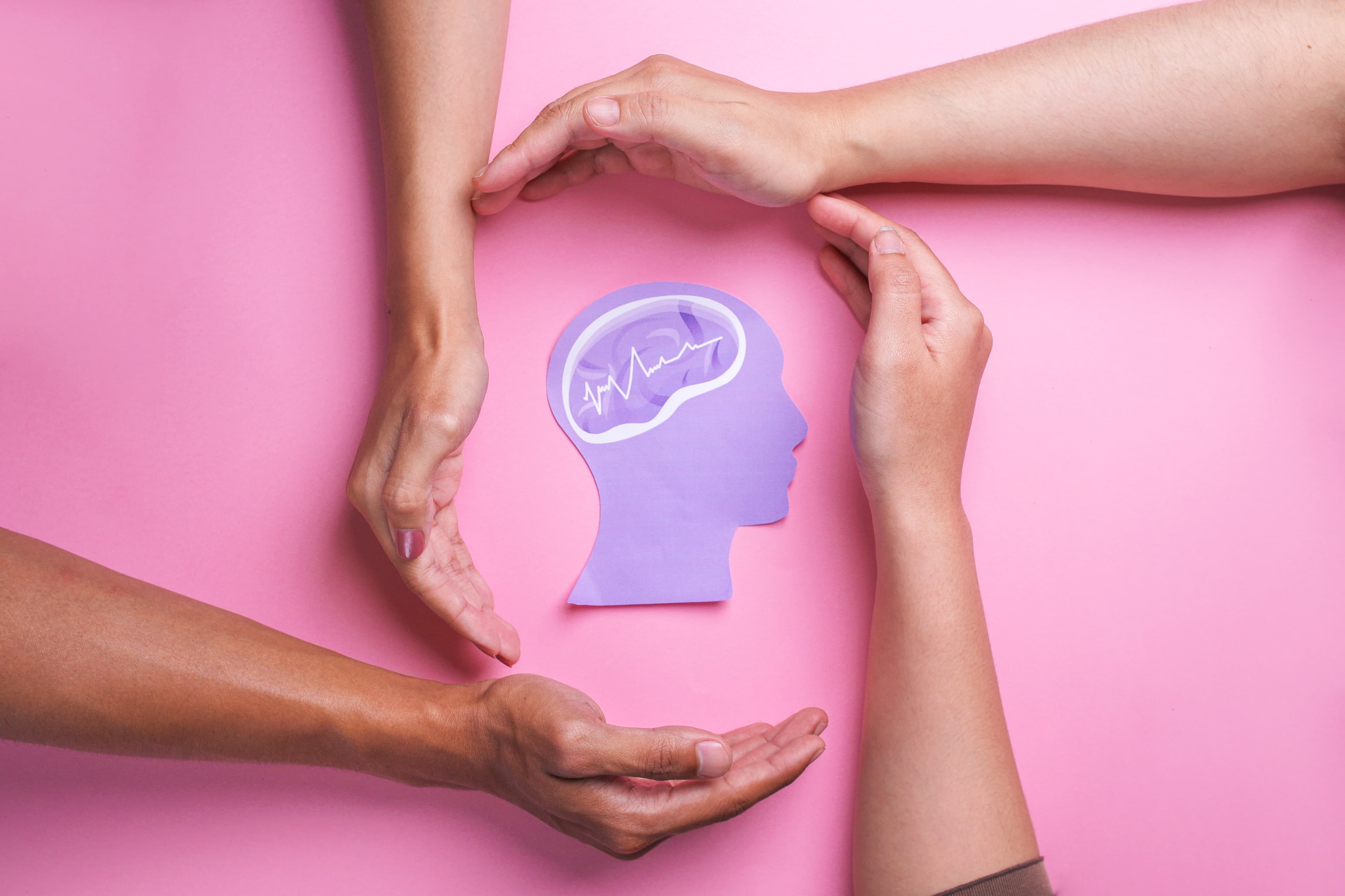 Hands cupped together in a circle of support